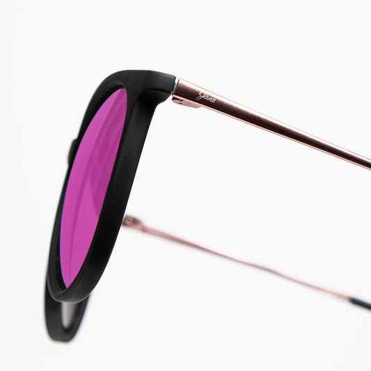 Stylish black round sunglasses with pink mirrored lenses and rose gold detailing from Jane Legacy