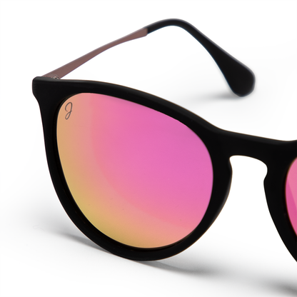 Stylish black round sunglasses with pink mirrored lenses and rose gold detailing from Jane Legacy